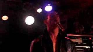 Paul Holmes Performing with Pitty Sing