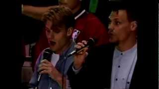 The Coats (Trenchcoats) Performing the National Anthem at A Sonics Game