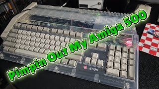 Amiga 500 gets a serious glow-up with a clear case from A1200net and some killer bling from AmigaKit