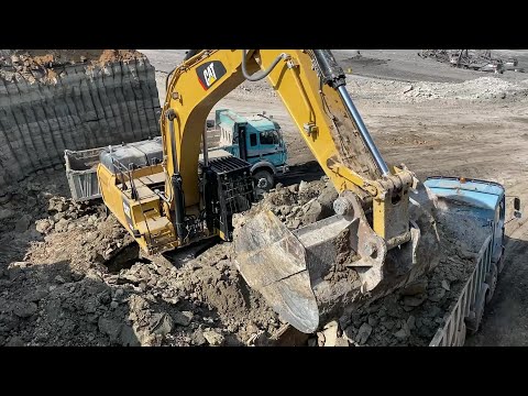 Caterpillar 352F Excavator Loading Mercedes & MAN Trucks - Ascon Ltd