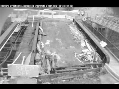 Car crosses pedestrian bridge at Rockland Street in Wellesley MA