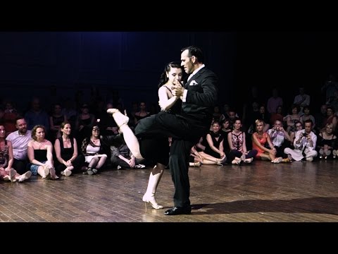  Anibal Lautaro  and  Ariadna Naveira  are  dancing  to  the  milonga  "  Con toda la voz que tengo  "  by  Aníbal Troilo  at  Brussels Tango Festival  in  2015