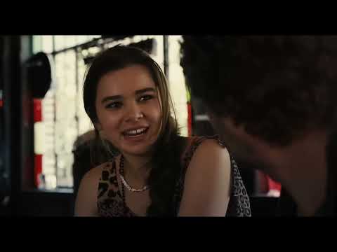 Begin Again trailer frame: bike-at-night city glide paralleling concert energy