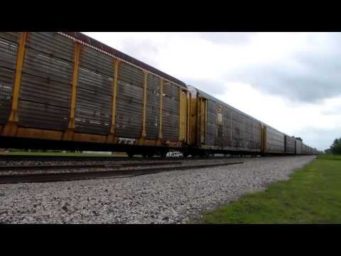 CN E26091 02 CSX AC4400CW leads Flint bound auto racks east at Bancroft, MI. 8/02/13