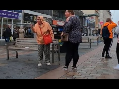 An Argument Over Bird Shit on Argyle Street in Glasgow Outside Marks and Spencer