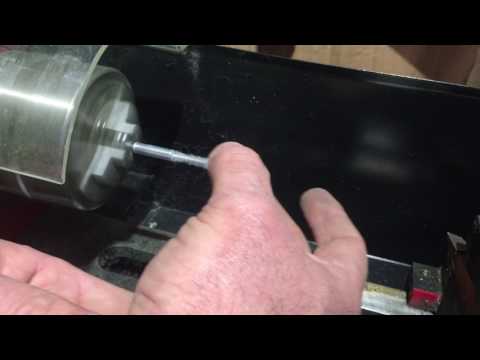 Derby Tricks polishing center bore on BSA Pinewood Derby wheels