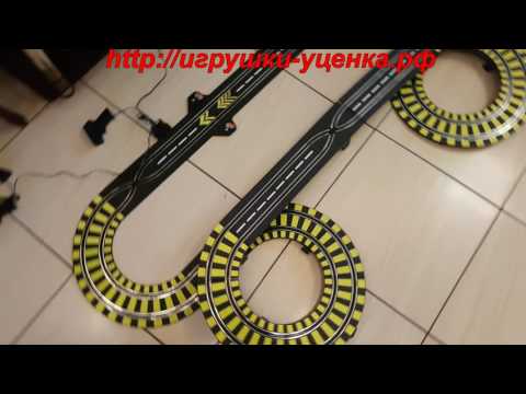 фото автотрек игрушечный детский с двумя машинками 0