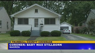 Coroner confirms nearly full-term fetus found outside Warren home was stillborn