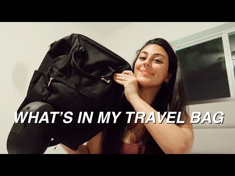 WHAT'S IN MY TRAVEL BAG ♡ VLOGMAS DAY 21| packing light, airport essentials
