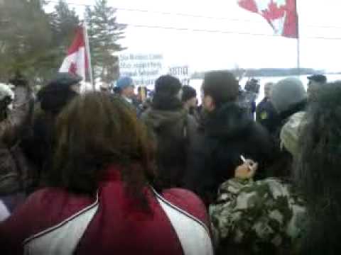 Caledonia Six nations - Women stand in front of anti-native rally Feb 27/11