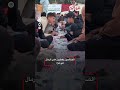 Despite the destruction and war, fasting people break their fast on the sand in Gaza