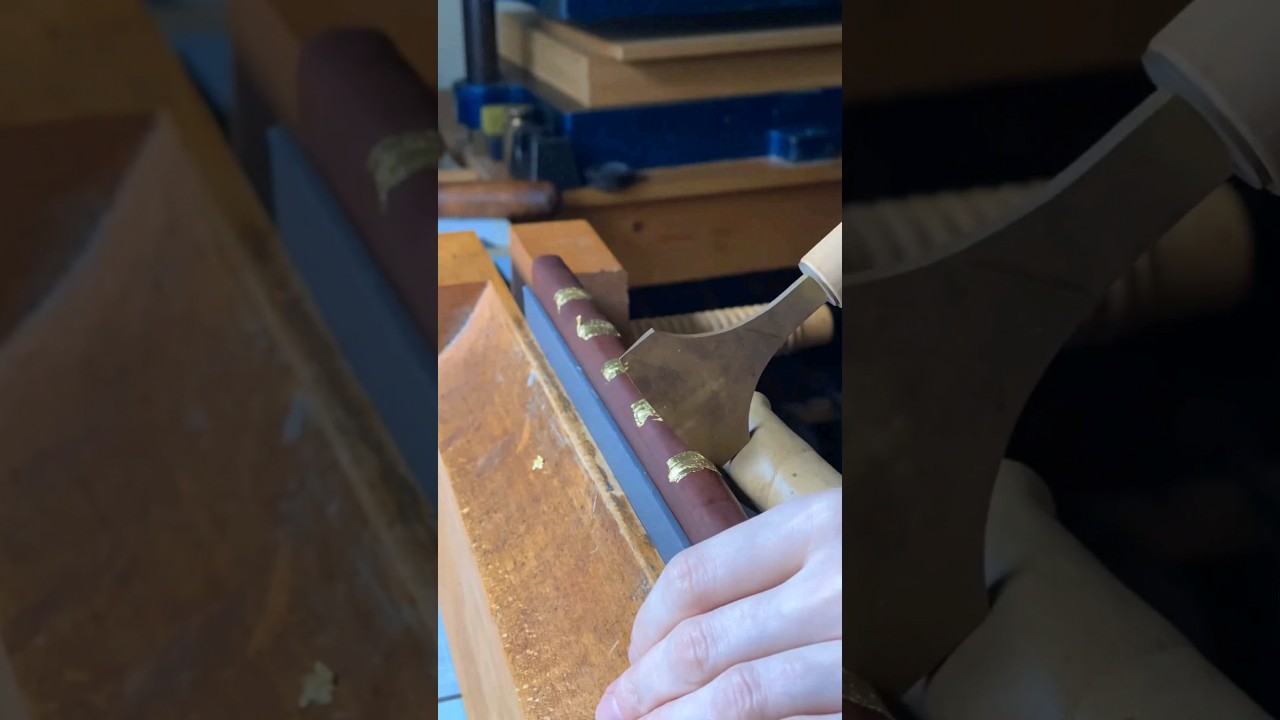 Gold tooling on a restored antiquarian book by Lorna McCurdy