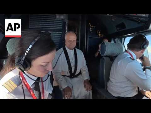 Pope Leo XIV sits in the cockpit for his flight from Madrid to Barcelona