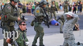 Man shot at Albuquerque protest, police detain armed militia members