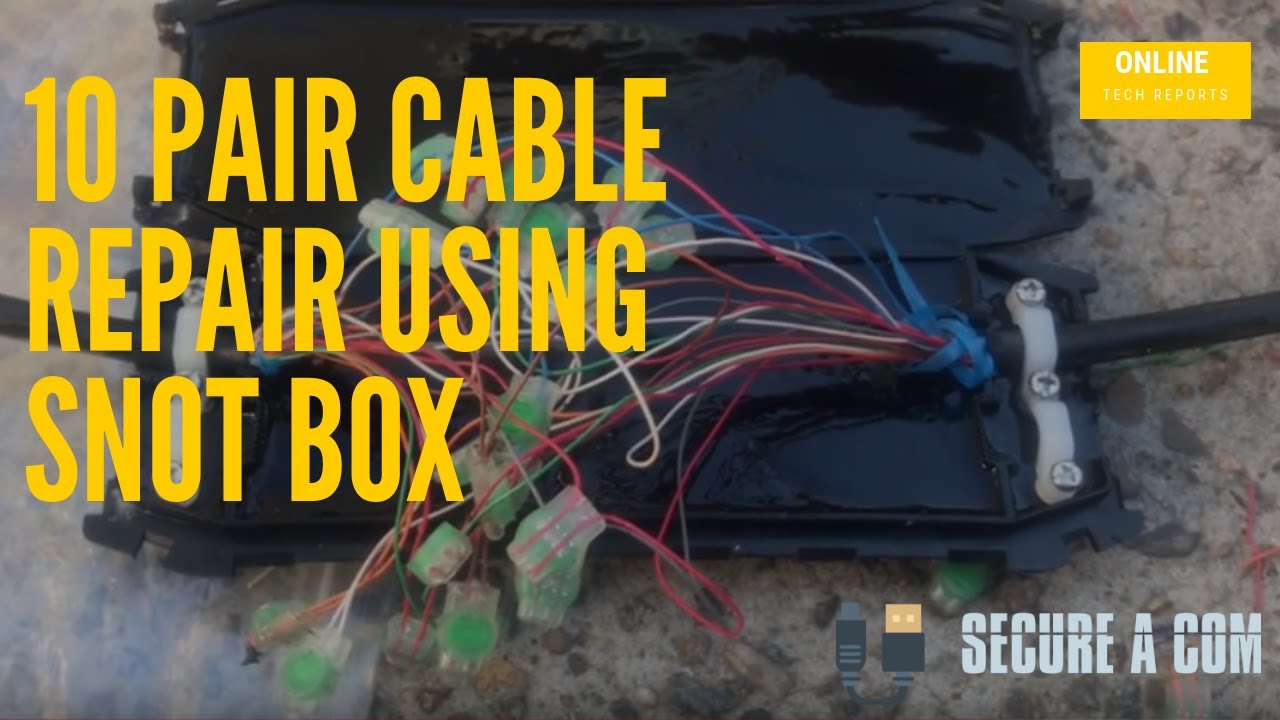 Commercial 10-pair cable fault repair using snot box joint enclosure — cable trapped under pit lid, fault located and repaired on-site, saving the client a full cable replacement