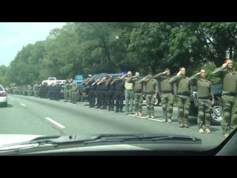 POFC. Jason Schneider's funeral procession. Tactical Unit tribute. 8-31-13.