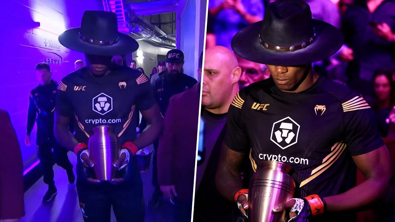 Israel Adesanya walks out to the Undertaker's theme song at #UFC276 in front of Vince McMahon & HHH