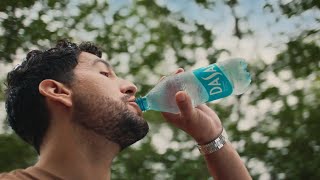 Dasani Couple leaving the house with a basketball