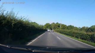 preview picture of video 'Dangerous overtake Porsche Boxter HF04 CUA Head on collision....narrowly avoided'