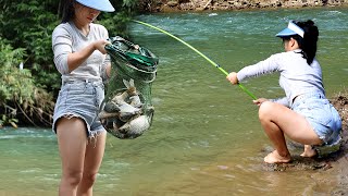 Girl fishing on the river -  didn't expect there to be so many fish here.