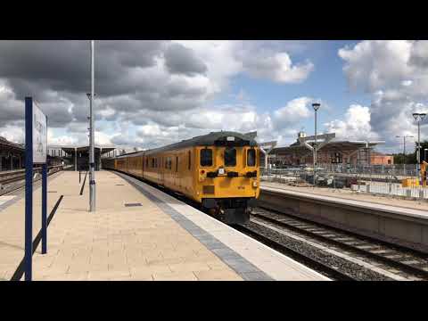 Colas Rail 37521 pushes a Network Rail Infrastructure Maintenance train from Derby