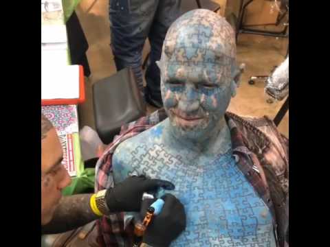 Freestyle Alex tattooing The Enigma