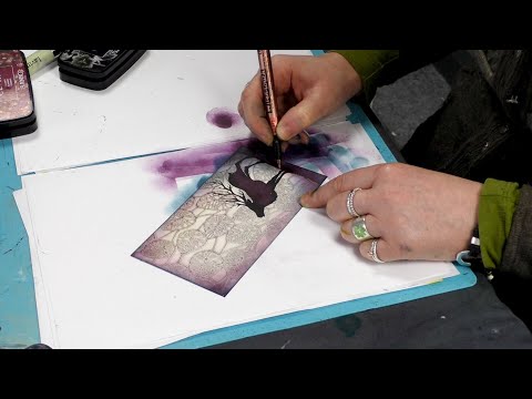 A card featuring Magnus and the new stencils by Tracey Dutton