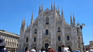 Download the video "Milan, Italy | City Center 4K Walk: Duomo, Galleria & Fashion Streets"