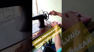 Download lagu How to manually wind thread onto a bobbin on a black sewing machine. mp3