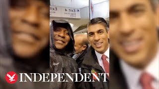 Prime minister Rishi Sunak sells poppies at Westminster tube station