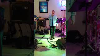 Rob singing Hold the Line