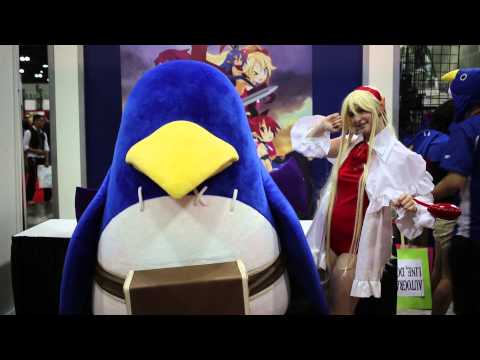 AX2013 - prinny and girl at the NIS booth