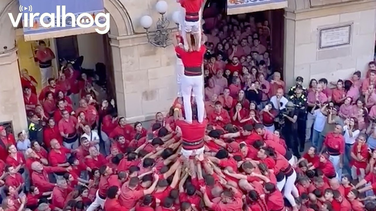 Human Tower Rises Nine People High in Spain || ViralHog