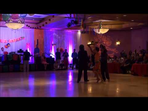  Ney Melo  and  Homer Ladas  are  dancing  to  the  milonga  "  La Colegiala  "  at  Tucson Tango Festival  in  2015