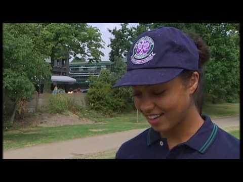 Ball girl takes on tennis ace
