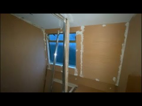 95. Upper wall goes in on Narrowboat bathroom