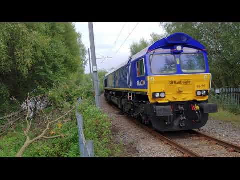 66 797 on the return Ashton to Tuebrook empty stone at Ince Moss this afternoon.