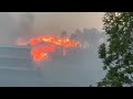 Pacific Palisades wildfire due to windstorm destroys many structures.mp4