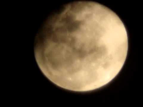 FULL MOON UNDER CLOUDS