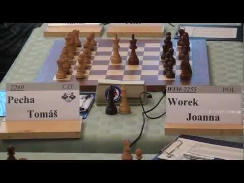 5.4. Tomáš Pecha  - WIM Joanna Worek  ½ - ½