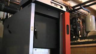 Firing a froling wood gasification boiler in Maine.