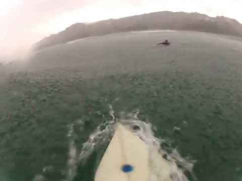 heavy down pour in an empty line up in Costa Rica