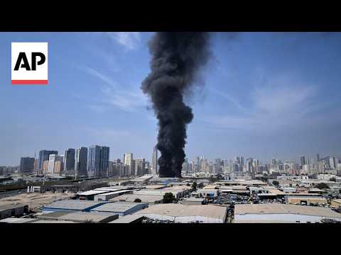 Smoke plumes rise in Sharjah and Dubai as Iran launches strikes at UAE
