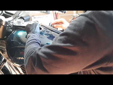 How to change the leaky check valve of a harley davidson & replace