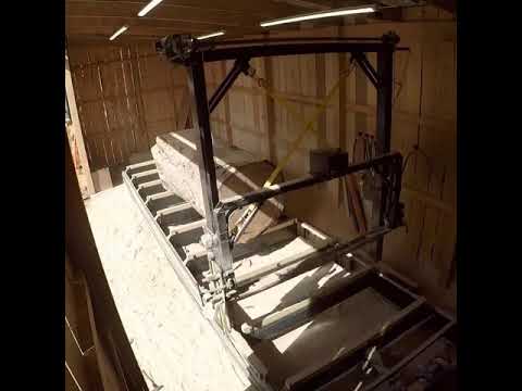 Quartersawing a giant white oak log on my electric chainsaw mill.