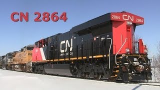 preview picture of video 'CN 2864 East, a New ES44AC, Running Long Hood Forward on 2-6-2014'
