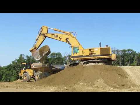 CAT 245ME loading Cat ADTs.