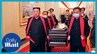 Kim Jong Un carries coffin of top North Korean military official