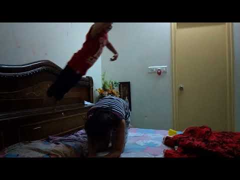 Small 2.5 years old boy jumping from bed awesome