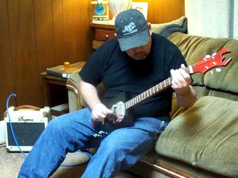 4 string cigar box guitar by Delta Groove Guitars